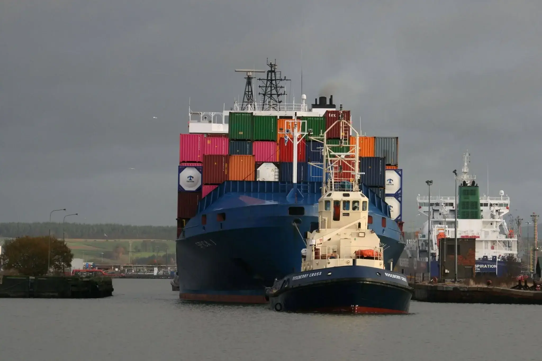 Container ship at port representing UK customs clearance and freight operations.
